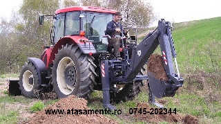 Brat de excavare - retroexcavator